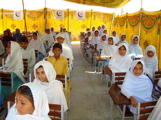 Pakistani students receive school uniforms