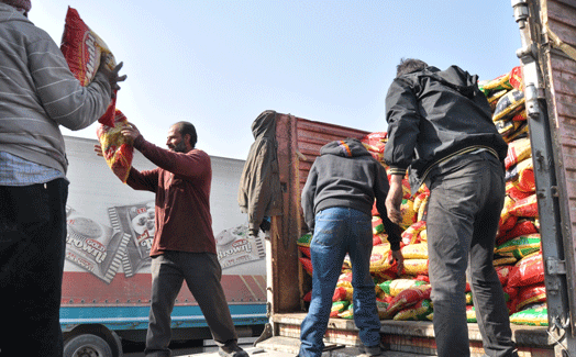 Aid trucks begin to reach Syria