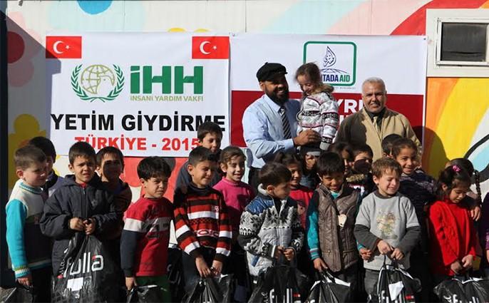 Suriyeli yetimlere kışlık kıyafet yardımı