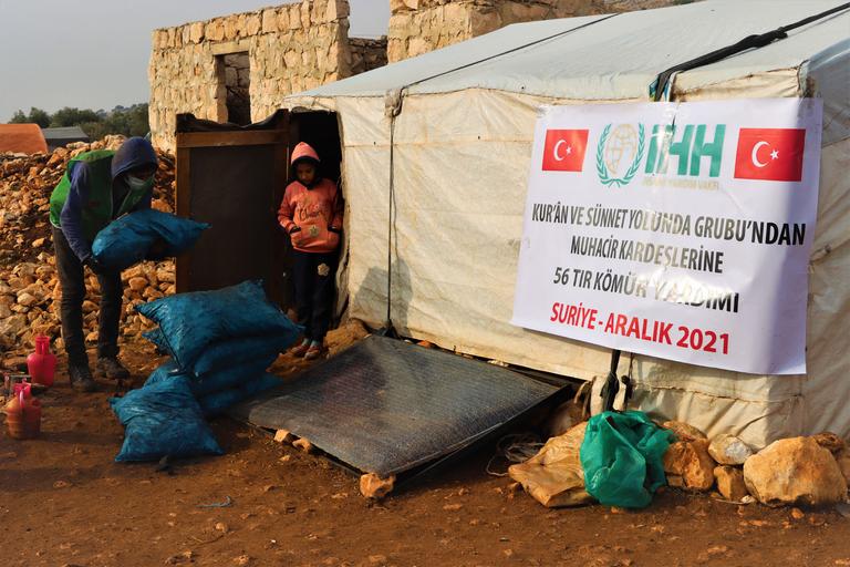 56 trucks of coal aid for Syria